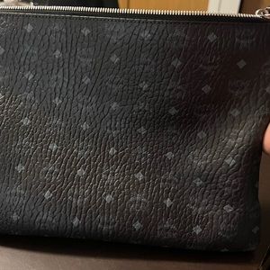 MCM Crossbody Pouch in Visetos Original, color is Black, the size is Medium.